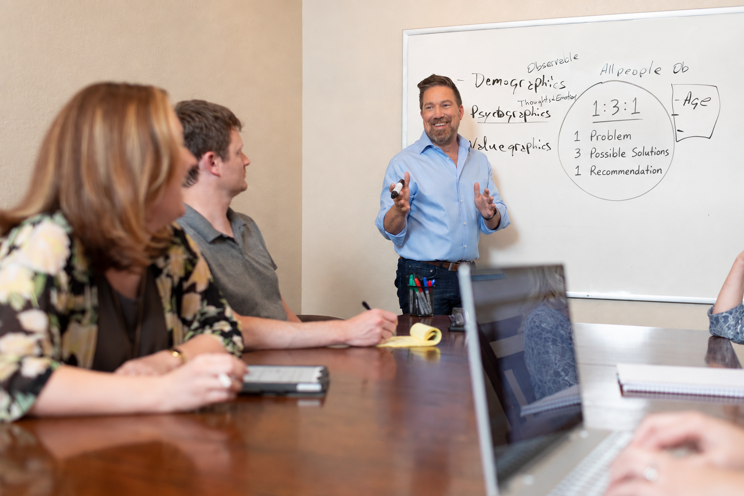 Michael teaching staff in conference room Michael teaching staff in conference room