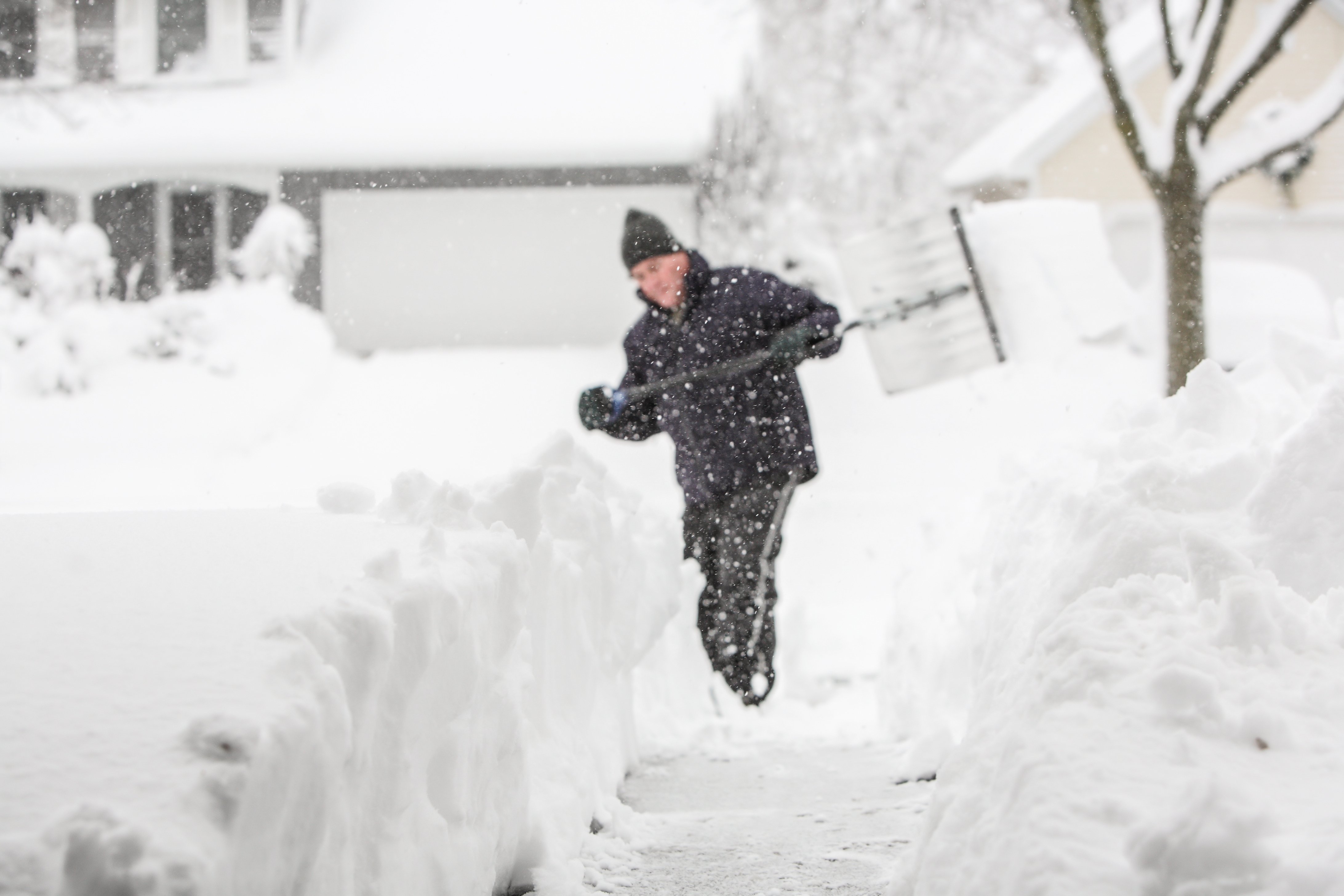 Person shoveling snow